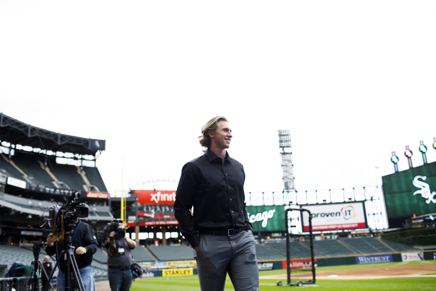 Michael Kopech walks on the field at Guaranteed Rate Field before a White Sox game on Sept. 6, 2017.
