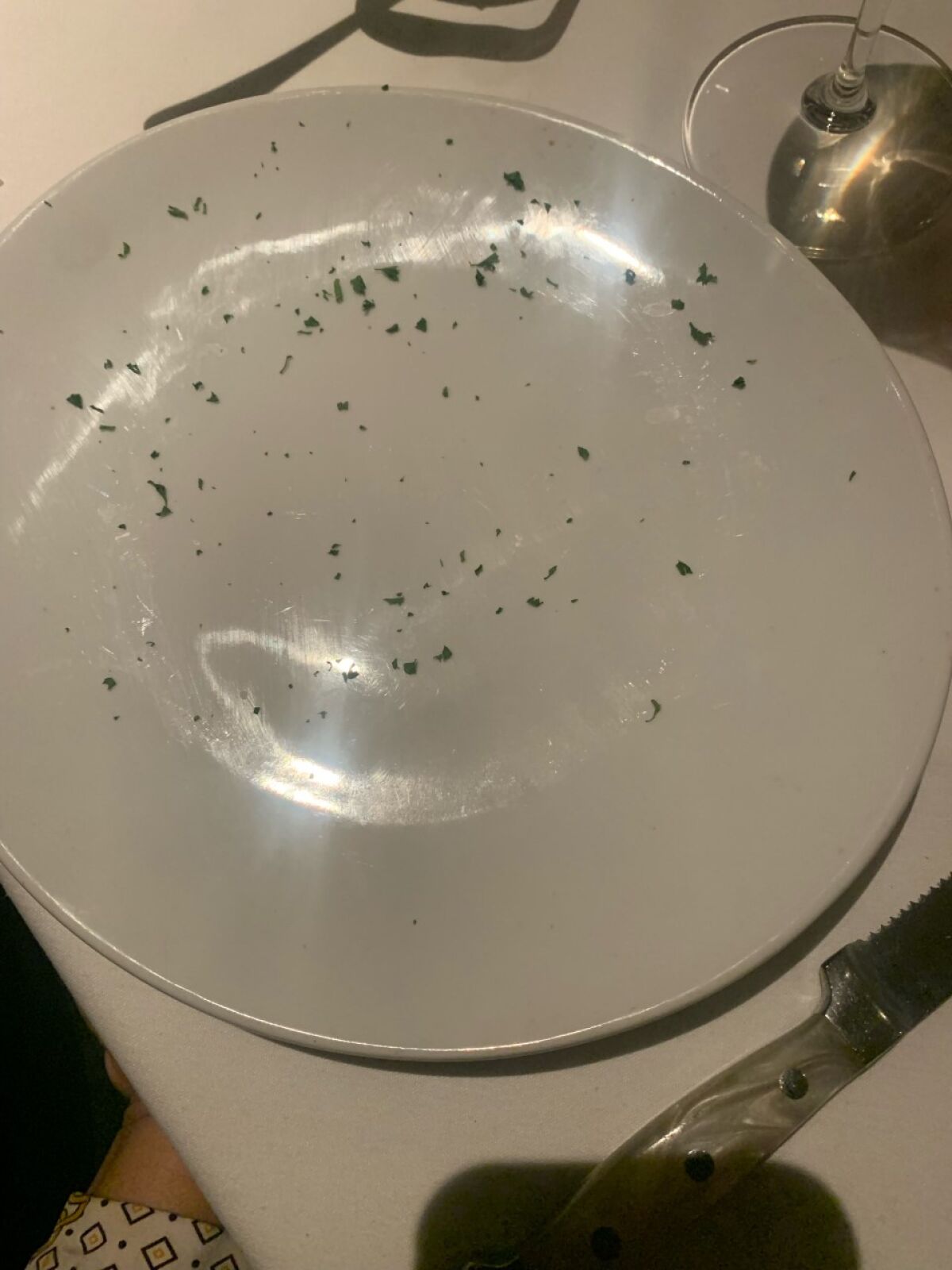 Mychel McKillian's lawsuit says he was served this empty plate at Fleming’s Prime Steakhouse & Wine Bar in La Jolla.