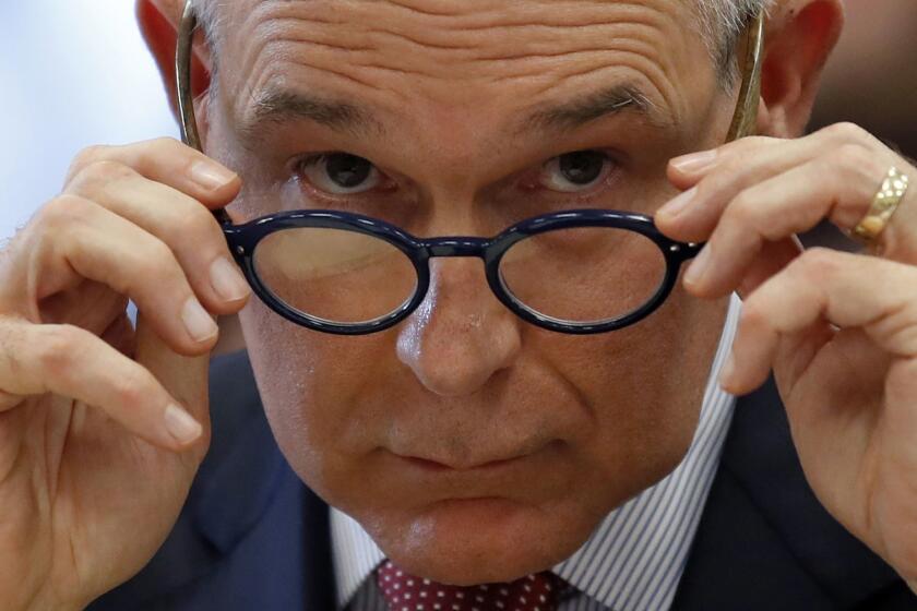 In this April 26, 2018 photo, Environmental Protection Agency Administrator Scott Pruitt removes his glasses as he testifies at a hearing of the House Appropriations subcommittee for the Interior, Environment, and Related Agencies, on Capitol Hil in Washington. The lobbyist whose wife rented a condo to Environmental Protection Agency head Scott Pruitt at $50 a night sought EPA committee posts for a lobbying client about the time Pruitt moved out, according to a newly released EPA memo. (AP Photo/Alex Brandon)
