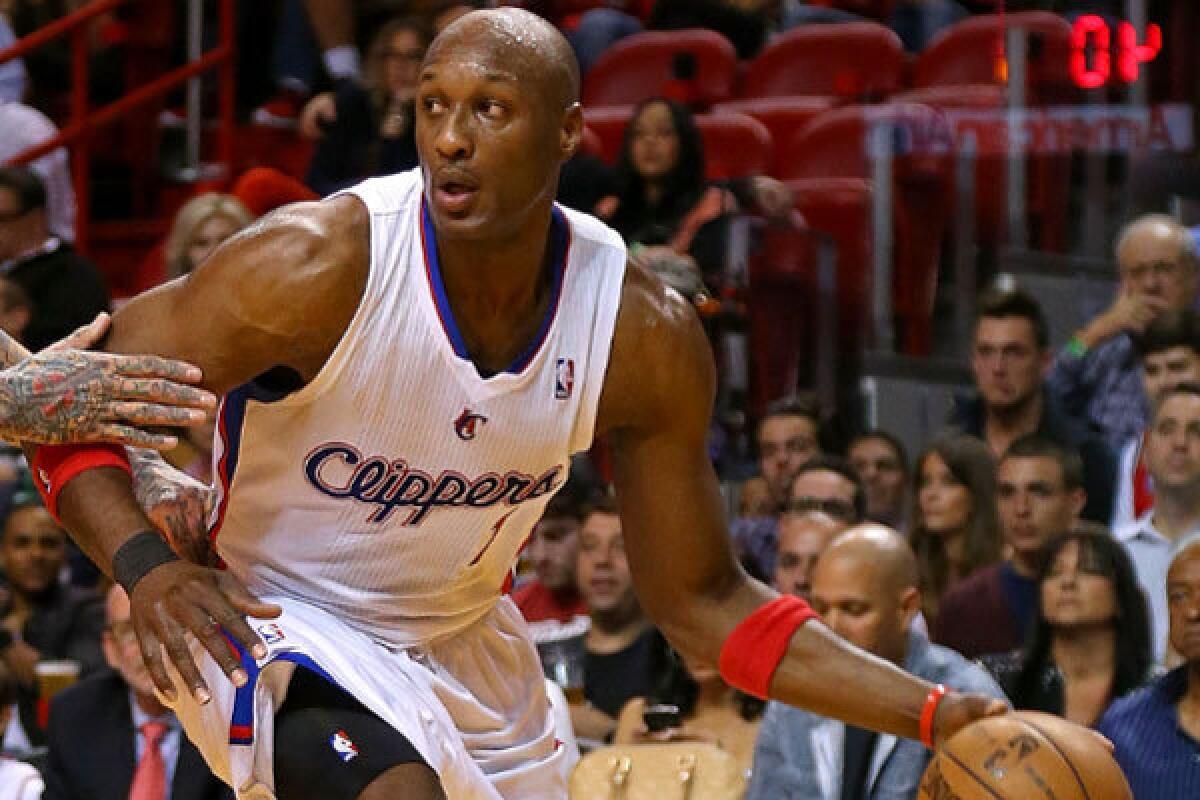 Former Clipper Lamar Odom, shown in February, is expected to visit the team's practice facility this week.