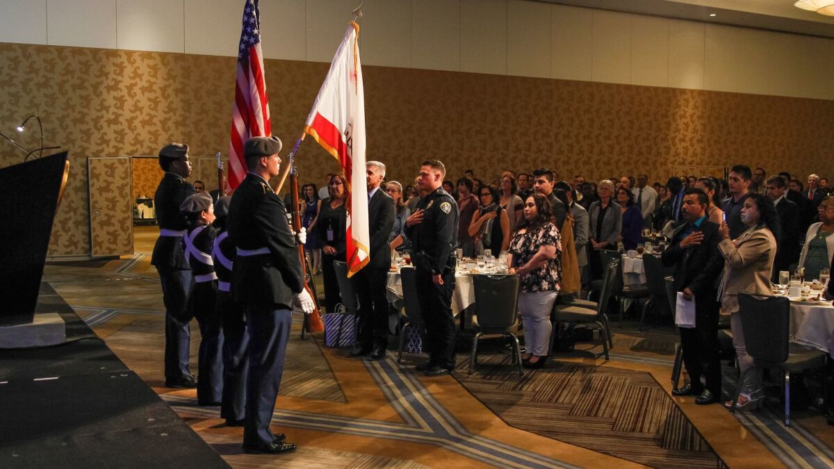 San Diego High School Junior ROTC presents colors during the Pledge of Allegiance at the Citizens of Courage Awards luncheon on Tuesday at the Hilton Bayfront in San Diego, California.