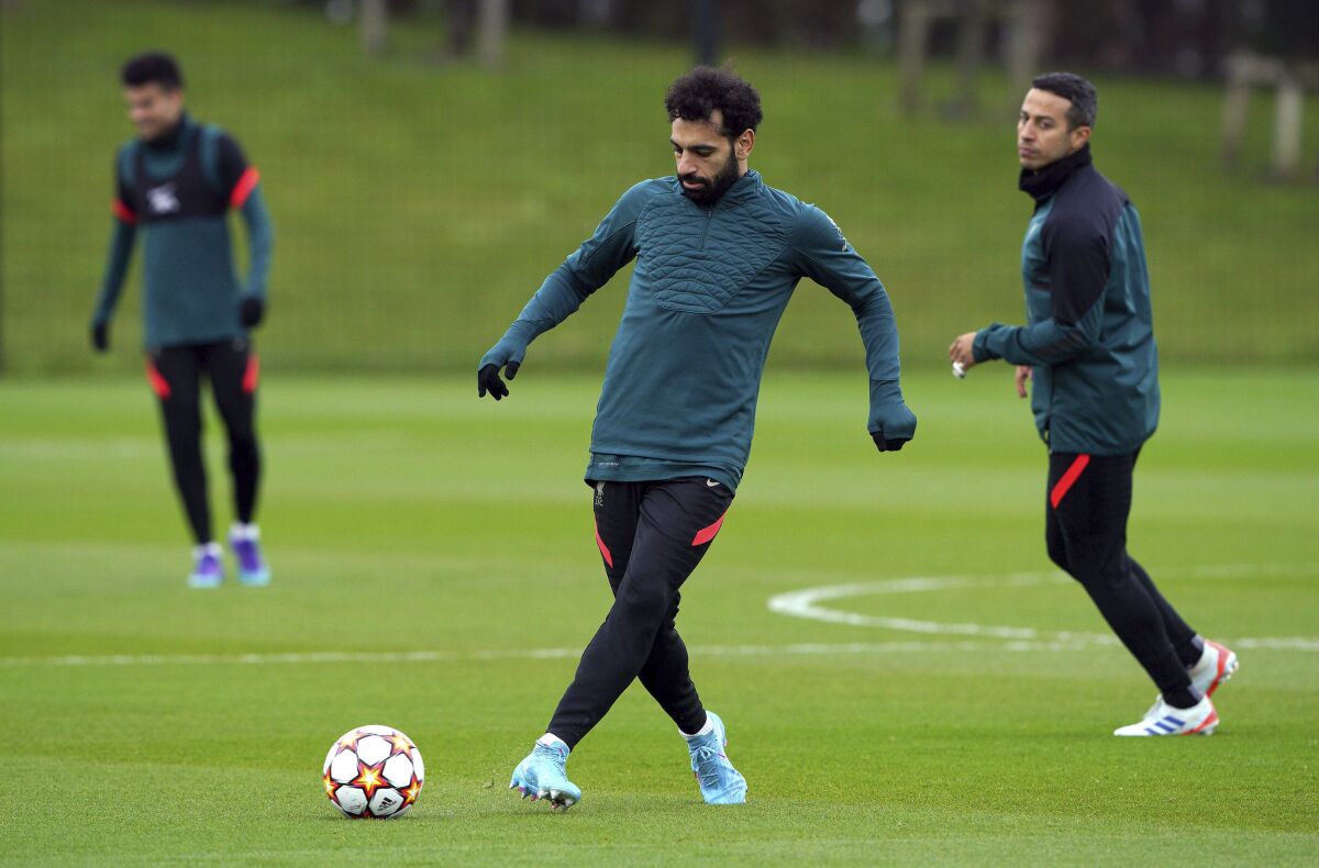 Liverpool's Mohamed Salah attends a training session ahead of Tuesday's Champions League, first-leg, quarterfinal soccer match against Benfica, at the AXA Training Centre, Liverpool, Monday April 4, 2022. (Peter Byrne/PA via AP)