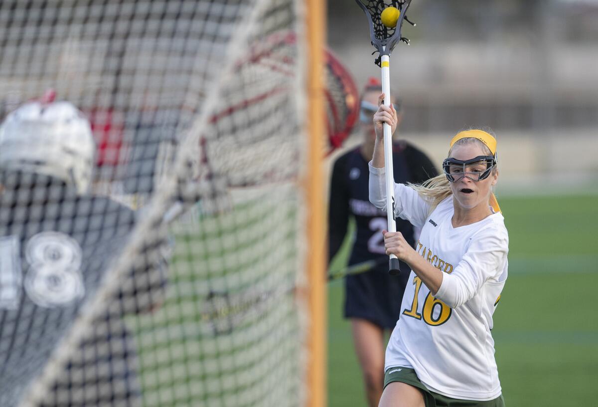 Edison's Blakely Malpass, shown competing against Yorba Linda on April 11, 2019, helped the Chargers rout University 16-5 on Thursday.