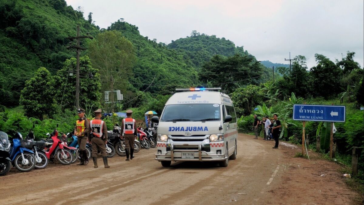 An ambulance leaves the scene near Tham Luang Nang Non cave on Monday in Chiang Rai province, Thailand.