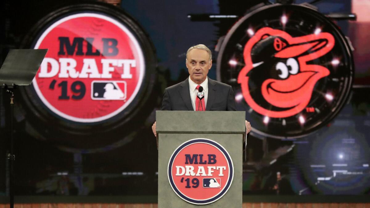 MLB Commissioner Rob Manfred announces the No. 1 selection by the Baltimore Orioles in the first round of the MLB draft on Monday.