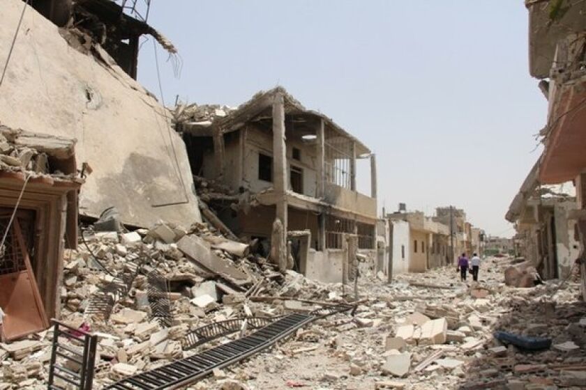 Weeks of fighting has left the Syrian town of Qusair in rubble.