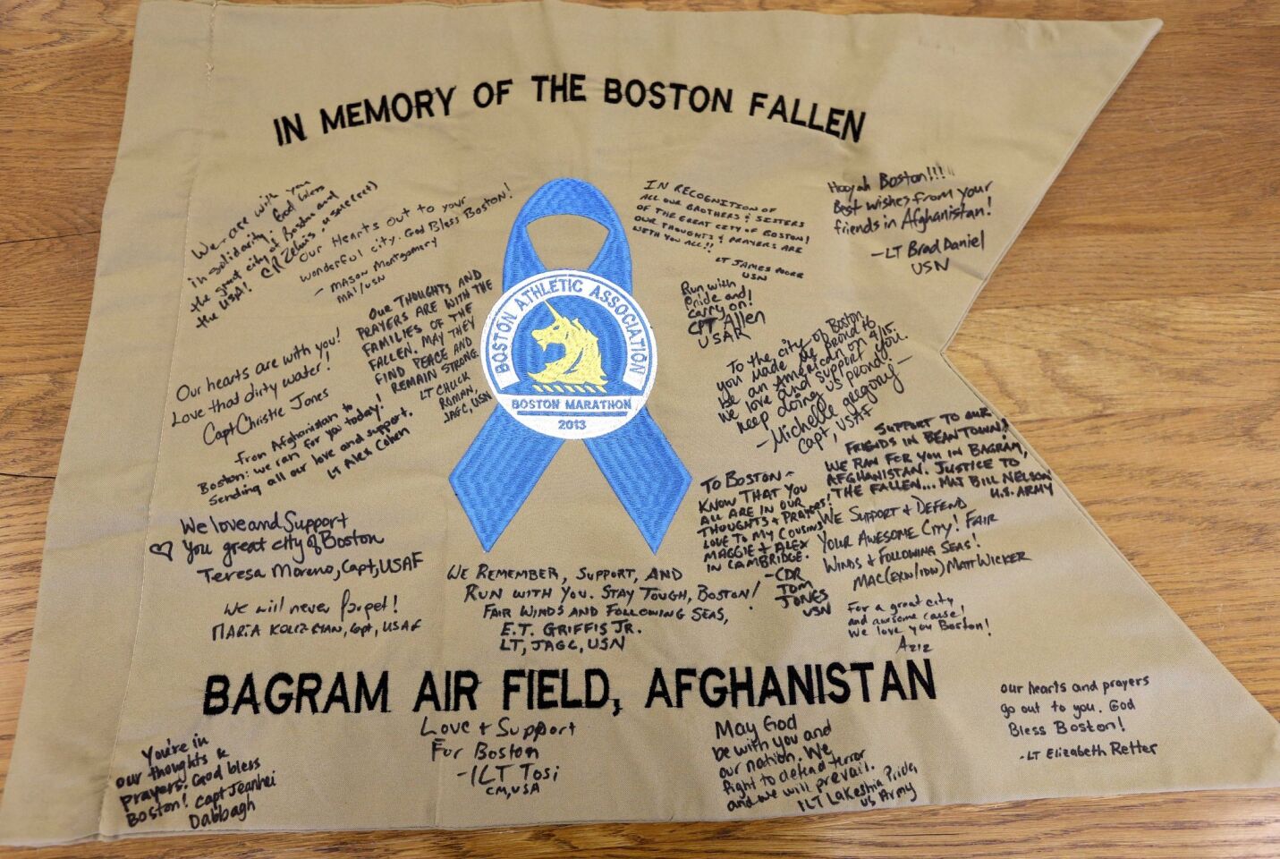A banner featuring messages of support and condolence from members of the armed services at Bagram air base, in Afghanistan, was part of the original memorial to bombing victims near the finish of the 2013 Boston Marathon.