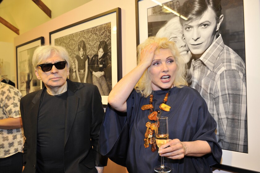 Blondie founders Chris Stein and Debbie Harry at Paul Smith Los Angeles celebrating an exhibition of Stein's photography (some of whch can be seen behind them) at the Melrose boutique through May 24.