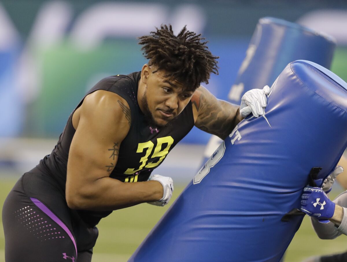 Boston College defensive end Harold Landry runs a drill during the NFL scouting combine.