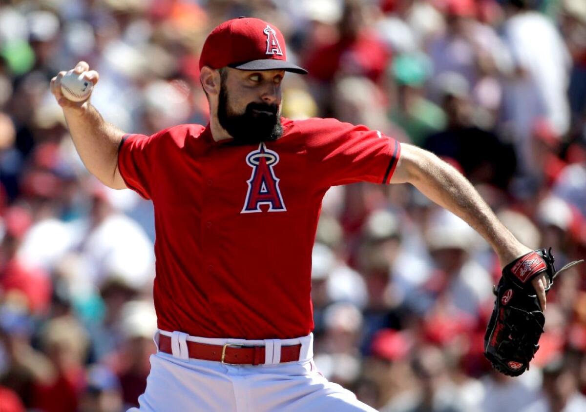 Angels starting pitcher Matt Shoemaker retired the first 13 Mariners batters in order in Monday's spring training game.
