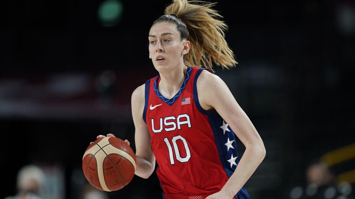 FILE - United States' Breanna Stewart (10) moves the ball during a women's basketball quarterfinal game against Australia at the 2020 Summer Olympics, Wednesday, Aug. 4, 2021, in Saitama, Japan. Some of biggest stars in the WNBA could be on the move with free agency set to begin this weekend. Some of the top unrestricted free agents include Sue Bird, Breanna Stewart and Jewell Loyd of Seattle; Liz Cambage of Las Vegas; Sylvia Fowles of Minnesota; Courtney Williams of Atlanta and Courtney Vandersloot, Allie Quigley and Stefanie Dolson of Chicago.(AP Photo/Eric Gay, File)