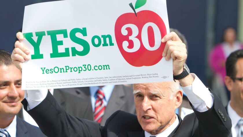 Gov. Jerry Brown campaigns for Proposition 30 on Oct. 23, 2012, in San Diego. Brown and other supporters said the measure's tax hikes were temporary, but Proposition 55 on the Nov. 8 ballot would extend income tax hikes on the wealthy for 12 years.
