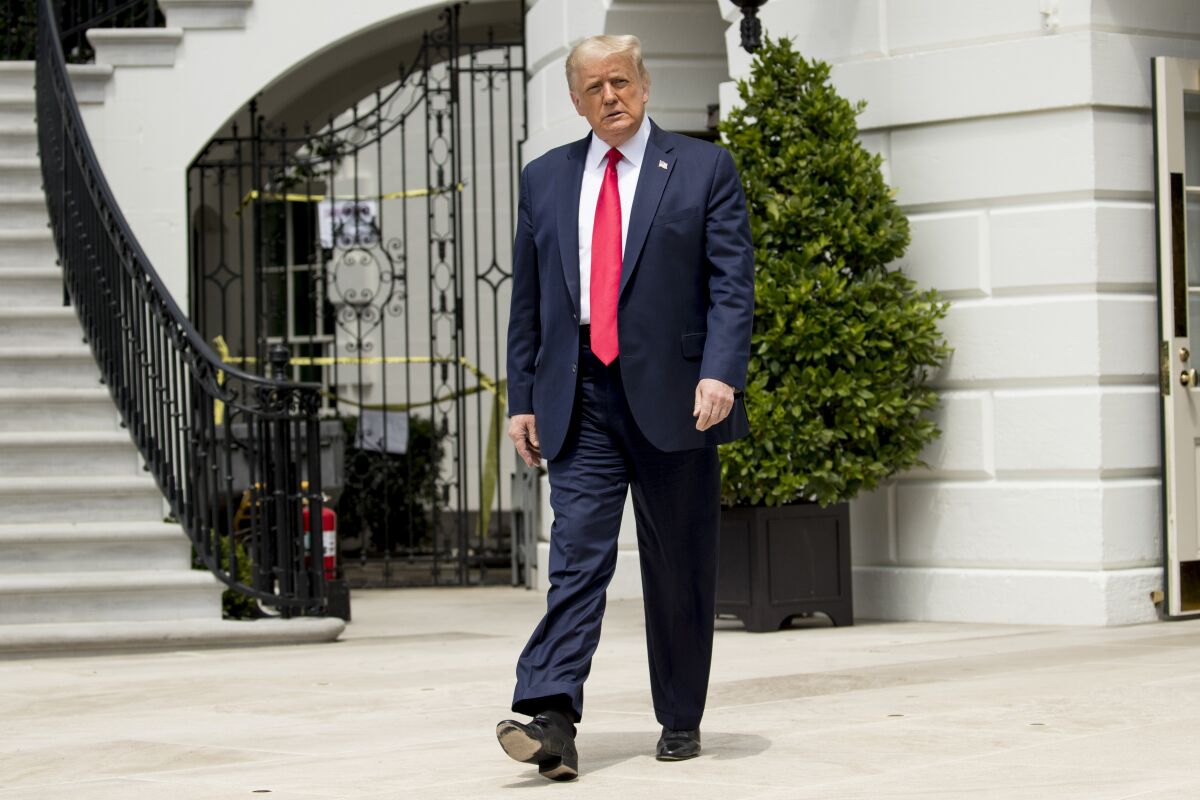 President Donald Trump leaves the White House Thursday before boarding Marine One for a trip to Andrews Air Force Base.