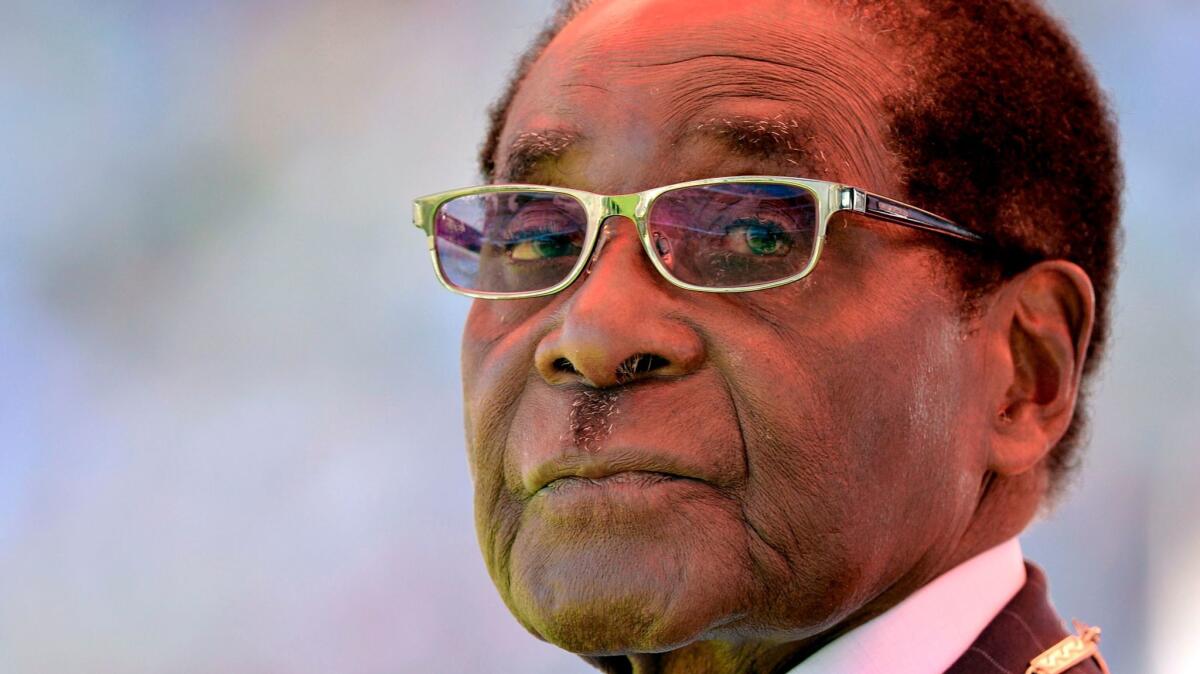 Zimbabwean President Robert Mugabe, shown at his last inauguration in 2013, long resisted pressure to step down. He relented after support within his ruling party collapsed.