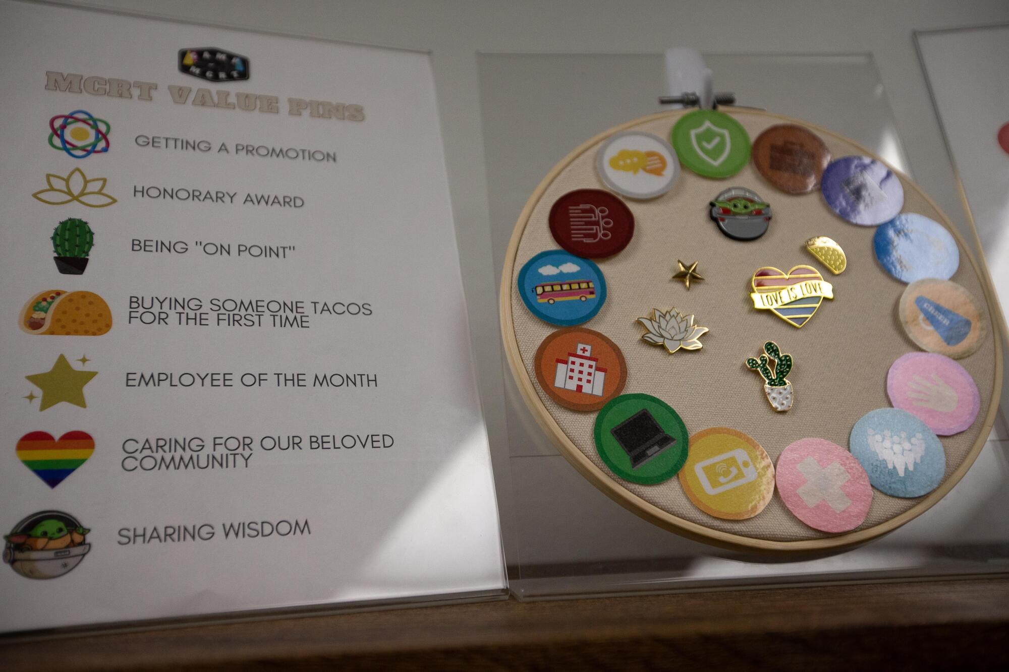 A display of pins that are given to Mobile Crisis Response Team members for various achievements