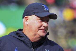 UCLA head coach Chip Kelly watches warmups before an NCAA college football game against Oregon.