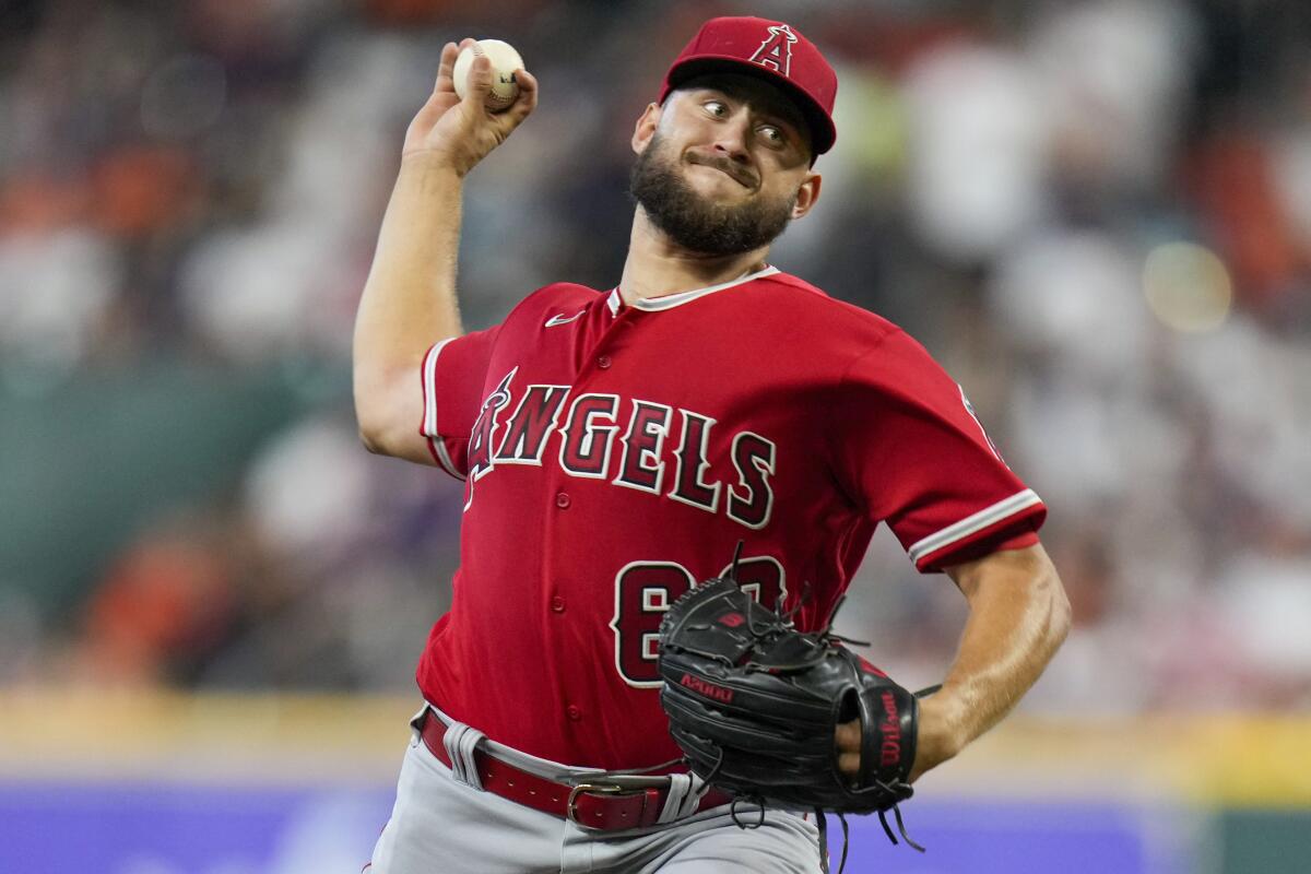 Angels starting pitcher Chase Silseth delivers during the first inning against the Houston Astros.