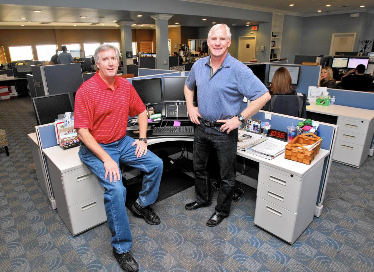 David Lund, ALC VP Sales & Operations, left, and his brother Kenny Lund, Allen Lund Company VP Support Operations, right, in the sales office of their building on Angeles Crest Highway in La Cañada Flintridge on Friday, Jan. 29, 2016.