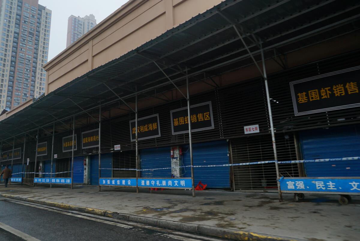 The Wuhan Huanan Wholesale Seafood Market sits closed in January 2020. 