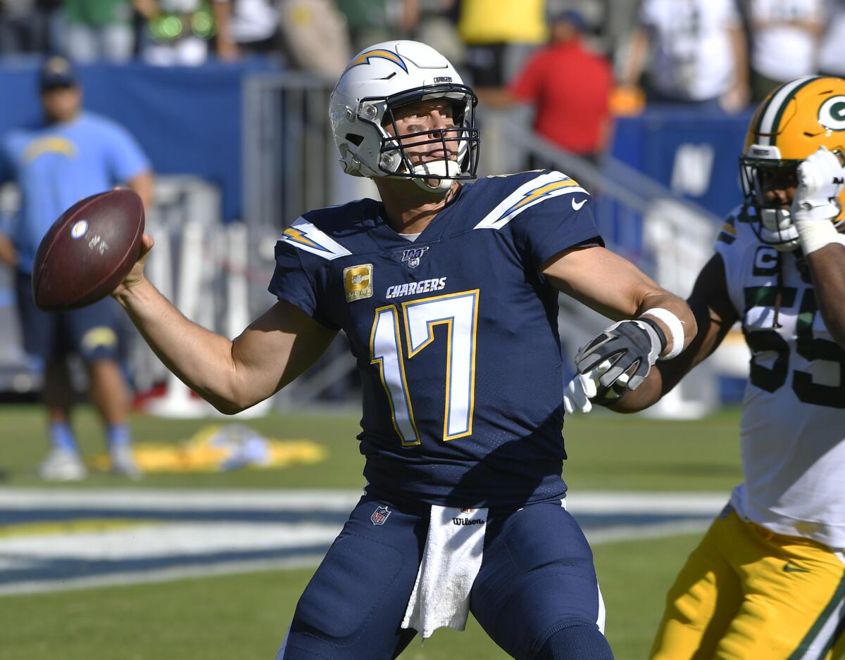 Chargers quarterback Philip Rivers passes against the Green Bay Packers.