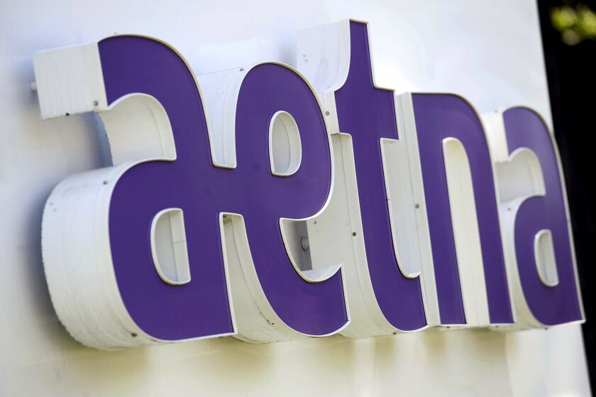 Aetna is seeking to merge with Humana in one of the two proposed health insurance mega-mergers facing state and federal scrutiny; the other deal would combine Anthem and Cigna.