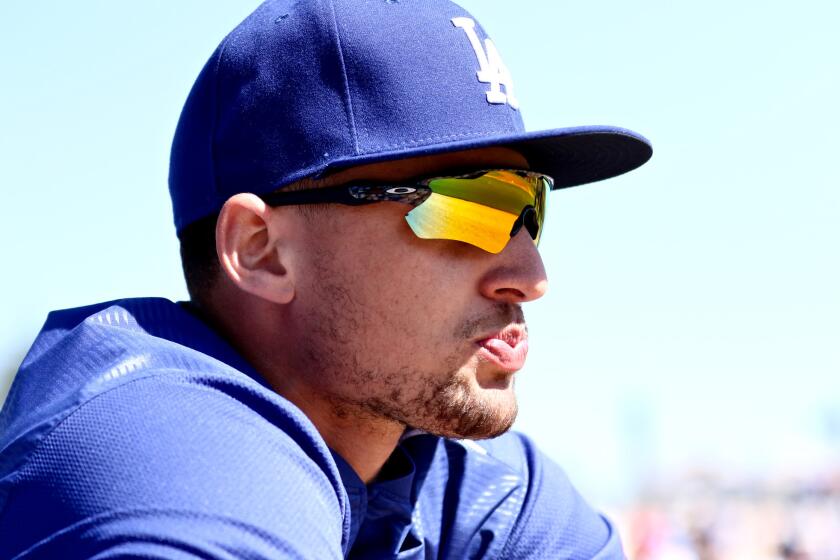 Dodgers outfielder Trayce Thompson looks on before a spring training game against the White Sox on Feb. 25.