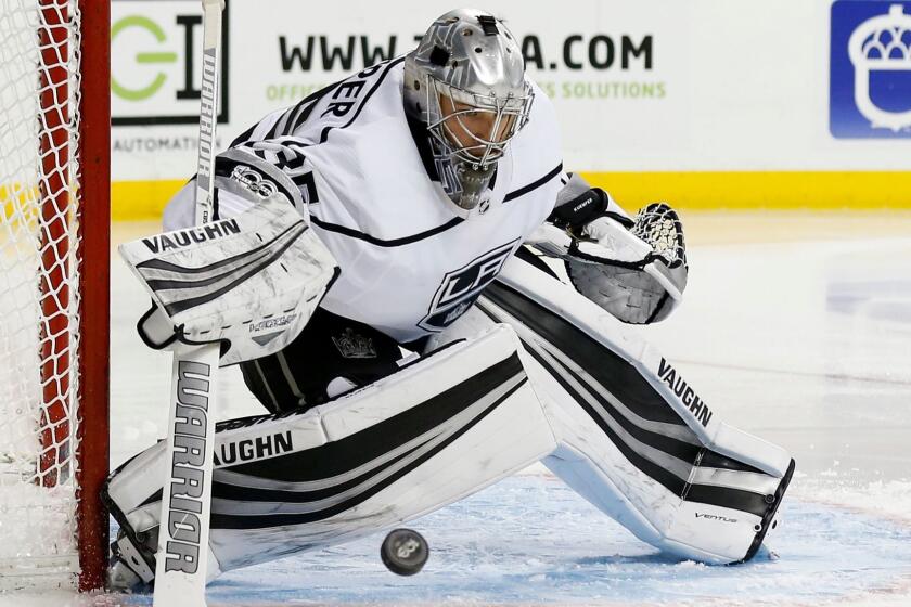 Los Angeles Kings goalie Darcy Kuemper makes a save against the New York Islanders in the second period of an NHL hockey game, Saturday, Dec. 16, 2017, in New York. (AP Photo/Adam Hunger)