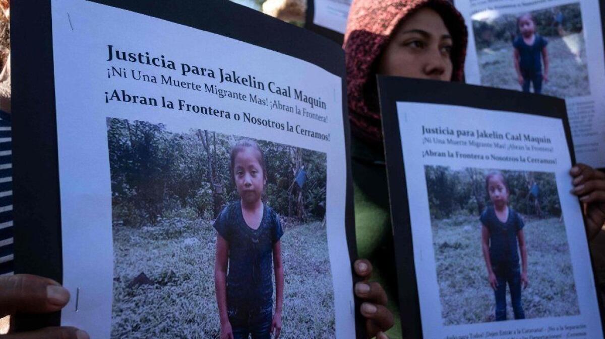 Central American migrants hold a demonstration in Tijuana on Dec. 15 following the death of 7-year-old Jakelin Caal Maquin.