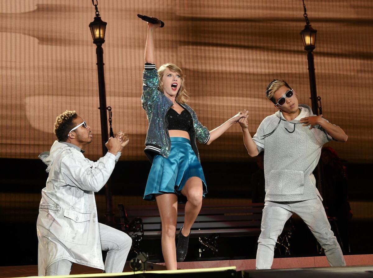 Singer Taylor Swift shows some midriff during her 1989 World Tour show at MetLife Stadium in East Rutherford, N.J., on July 10, 2015.