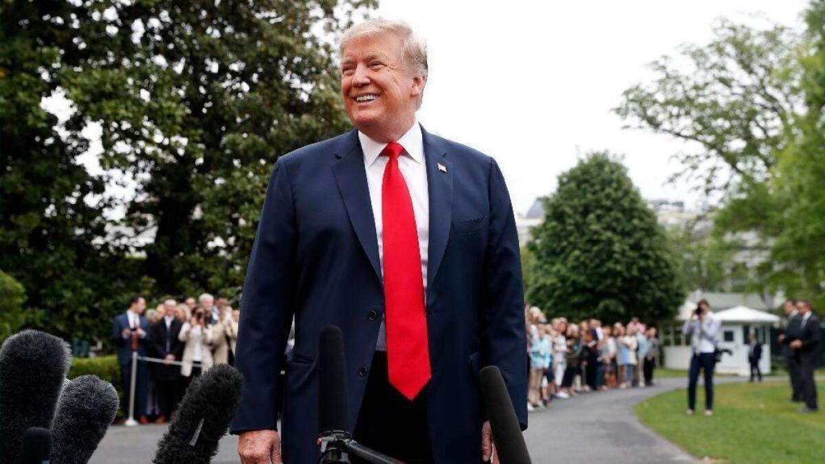 President Trump departs the White House on Friday en route to Indianapolis, where he was to speak at the annual meeting of the National Rifle Assn.