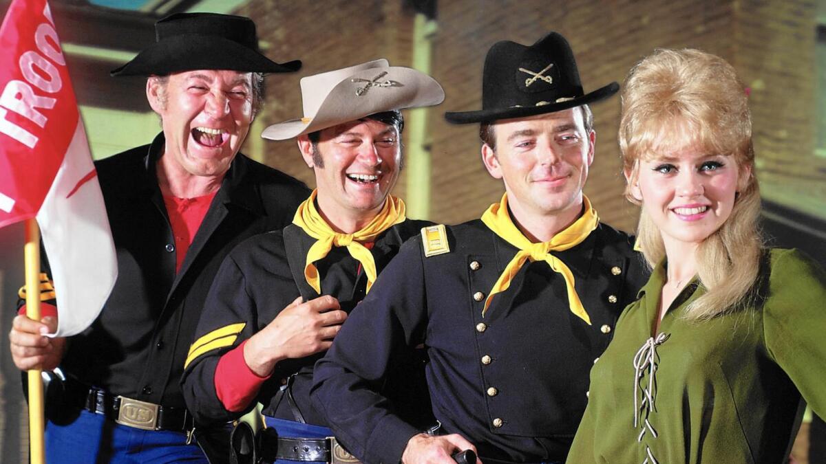 Melody Patterson, right, with fellow "F Troop" cast members Forrest Tucker, left, Larry Storch and Ken Berry. Patterson, who played Wrangler Jane on the 1960s sitcom, has died at the age of 66.