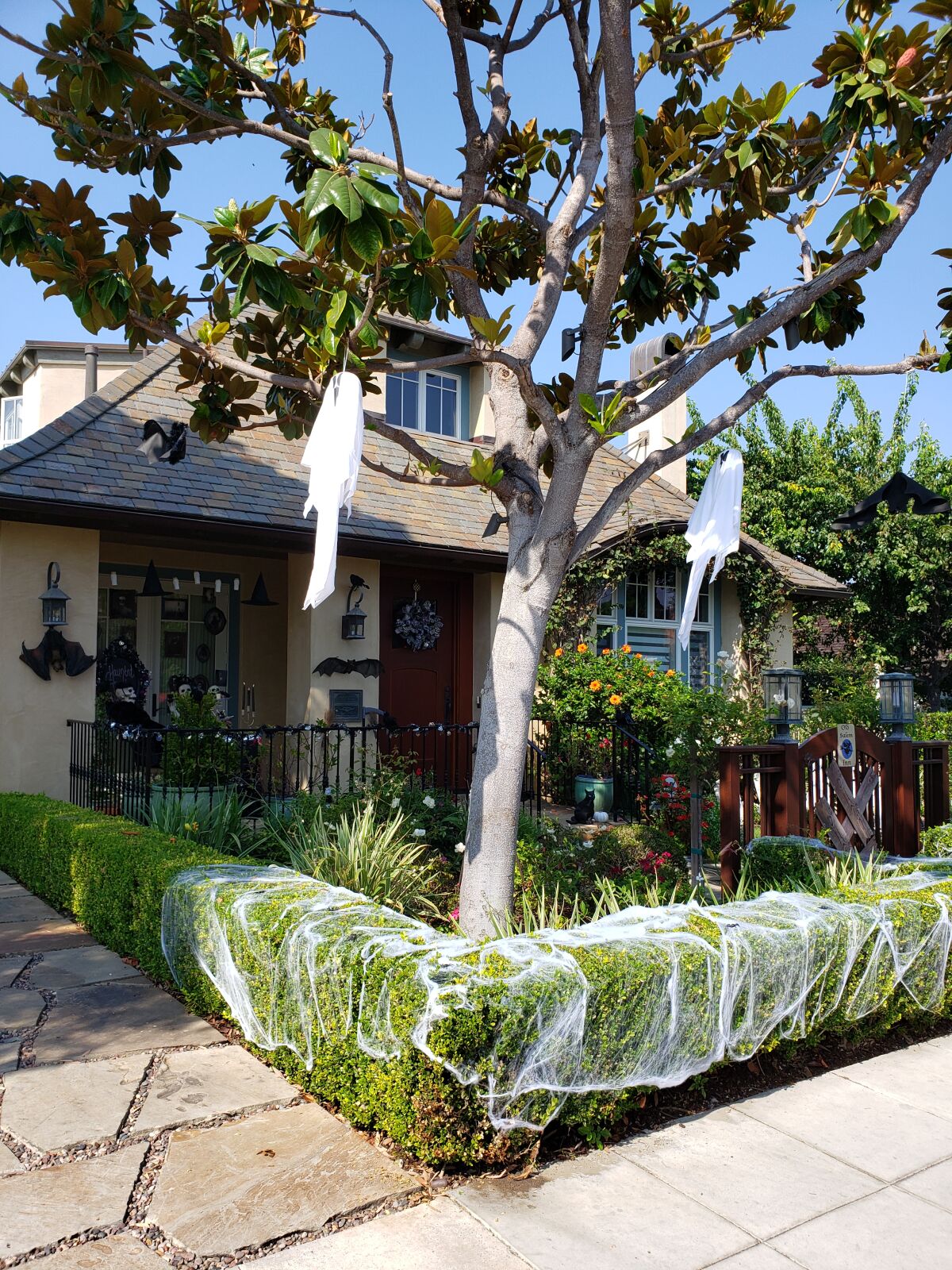 Ghosts, spider webs and other Halloween essentials adorn this Barber Tract house.