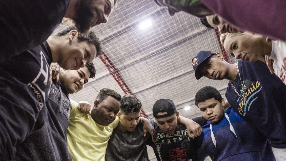 Raphael Henrique Martins offers words of encouragement to team members before practice.