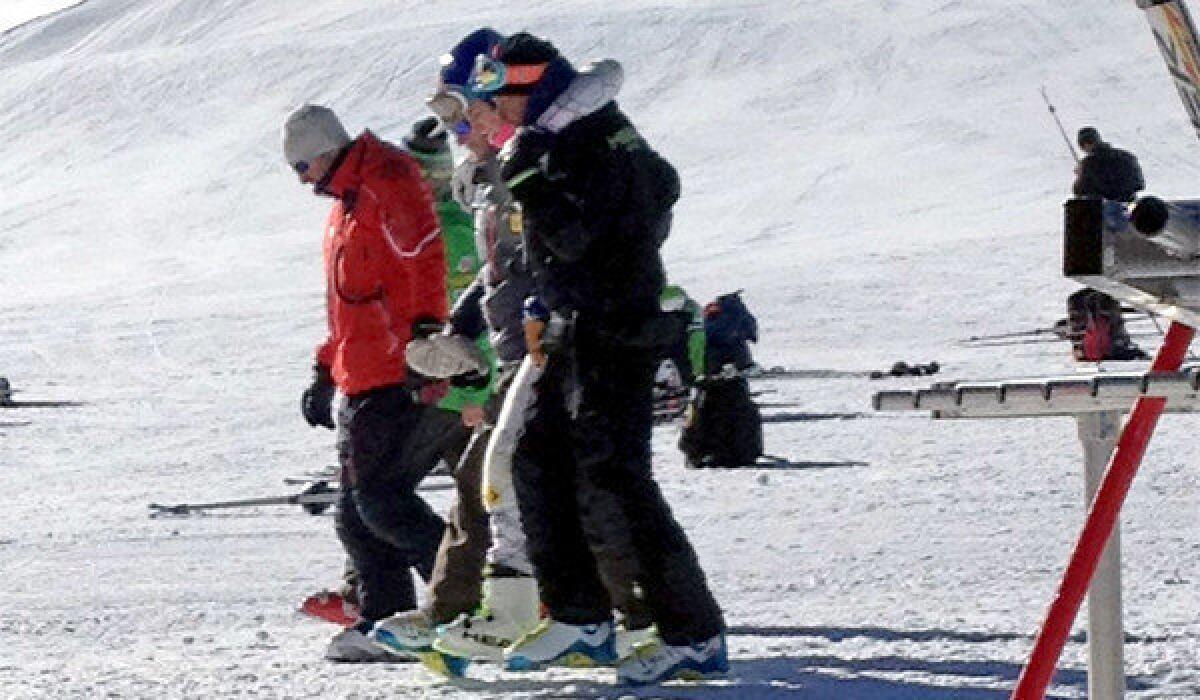 Reigning olympic downhill champion Lindsey Vonn is helped off the slope at Copper Mountain, Colo. on Tuesday following a crash during her training ahead of the 2014 Sochi Olympics.