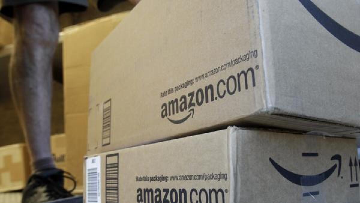 Higher spending on ultra-fast shipping contributed to Amazon's first quarterly profit decline in two years.