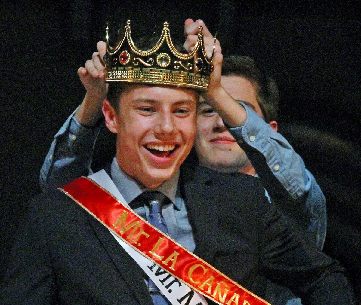 Zac Main is crowned by host Josh Cabello as Mr. La Canada 2015, a male student beauty pageant, at La Canada High School on Friday, March 27, 2015. The pageant is a fundraiser for the Joyful Heart Foundation, an organization founded by Law & Order" SVU's Mariska Hargitay with a mission to heal, educate and empower the survivors of sexual assault, domestic violence, and child abuse.