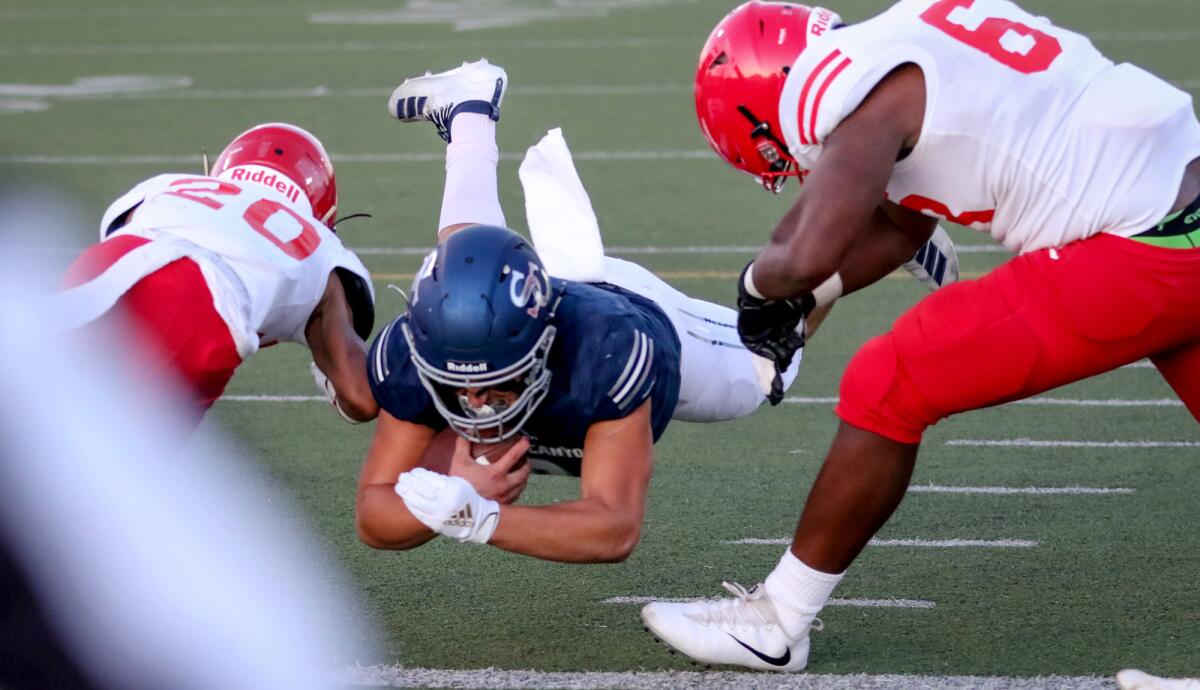 Sierra Canyon quarterback Chayden Peery dives into the end zone for a touchdown last season.