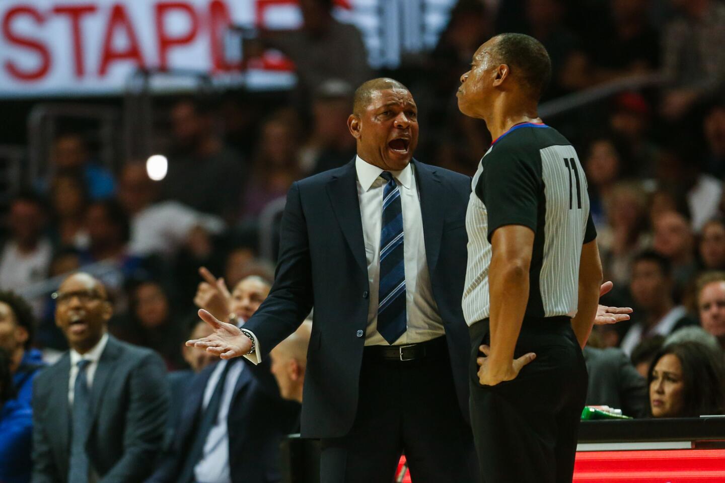 Clippers coach Doc Rivers argues with referee Rodney Mott