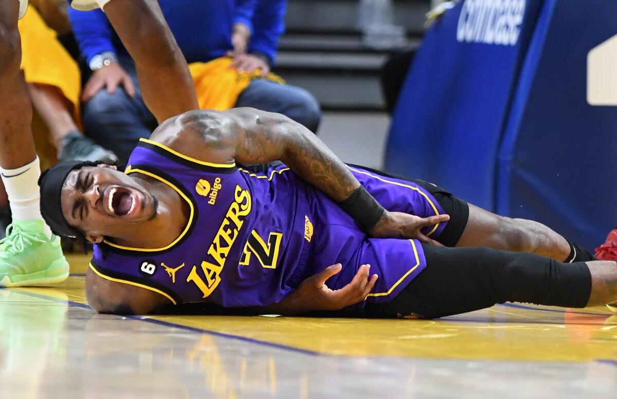 Jarred Vanderbilt yells in pain after Moses Moody landed on his foot in the first half in Game 2.