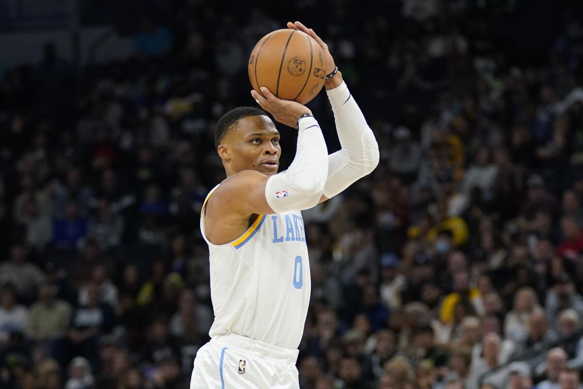 Guard Russell Westbrook shoots during the first half of a game between the Lakers and Minnesota Timberwolves.