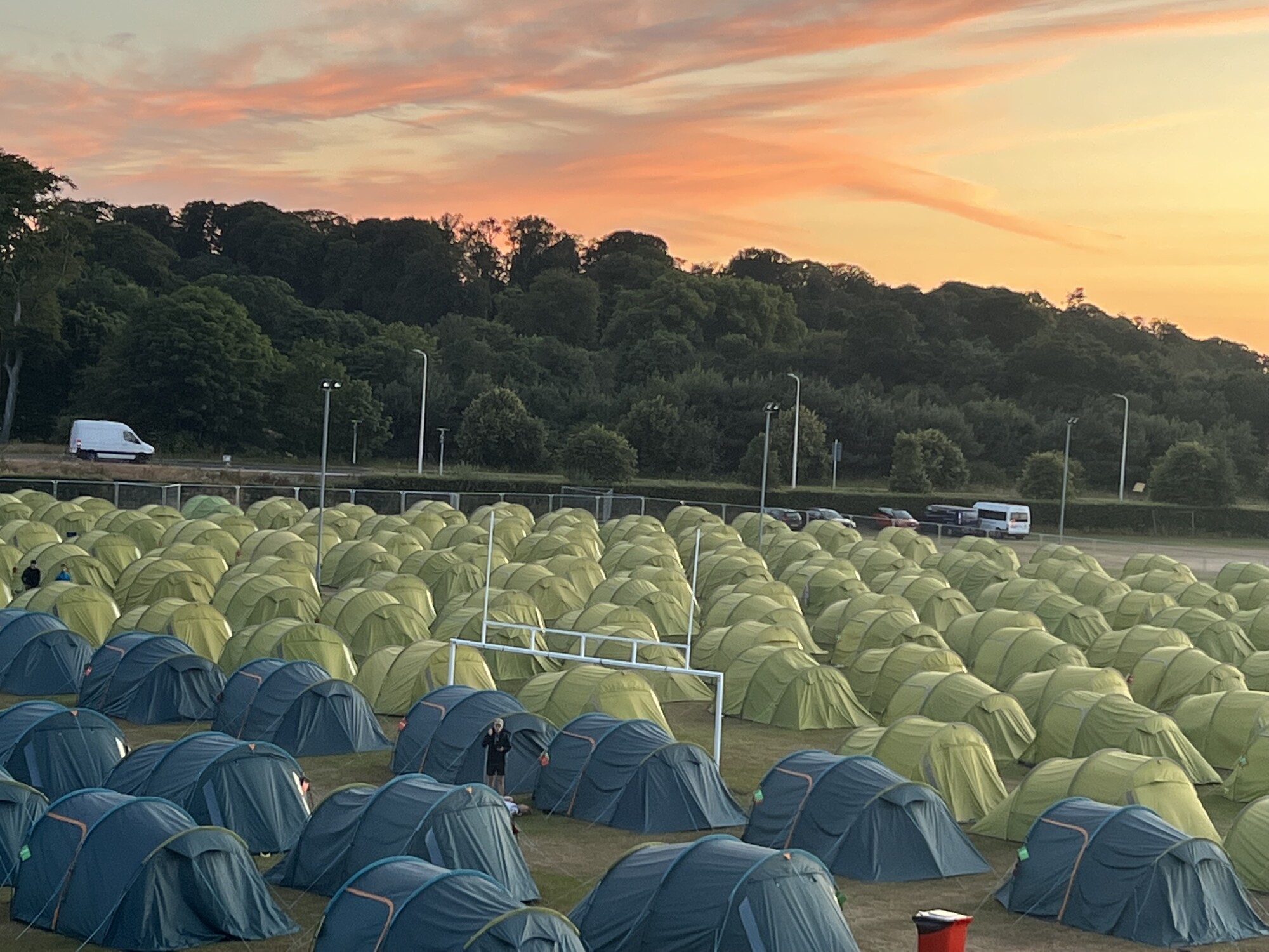 770 cozy nylon tents stand in front of the 17th green of the Old Course in St. Andrews.