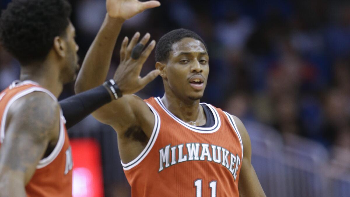 Milwaukee Bucks guard Brandon Knight, right, is congratulated by teammate O.J. Mayo during a win over the Orlando Magic on Jan. 29.