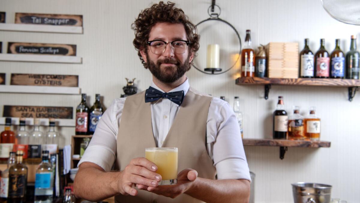 Peyton Tucker is the sake expert, cocktail-maker and unofficial emcee at Sushi Bar.