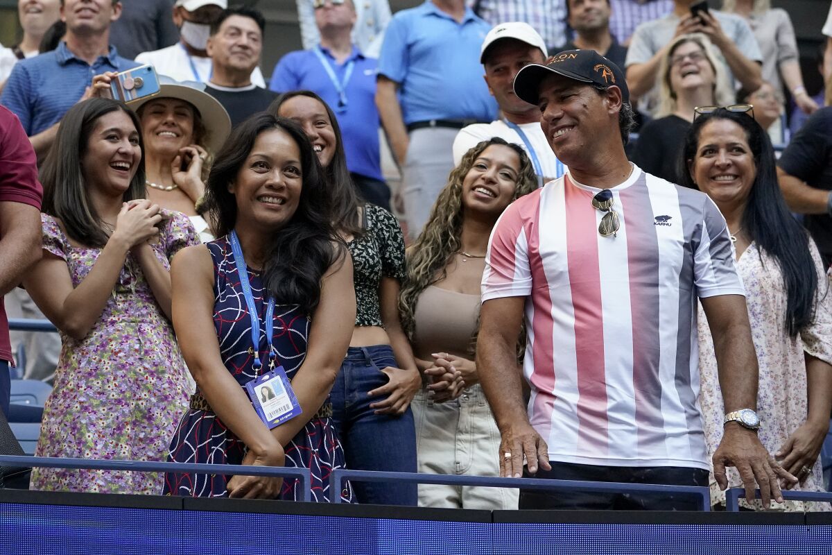 Irene Exevea and Duglas Cordero react after Leylah Fernandez defeated Elina Svitolina at the US Open.