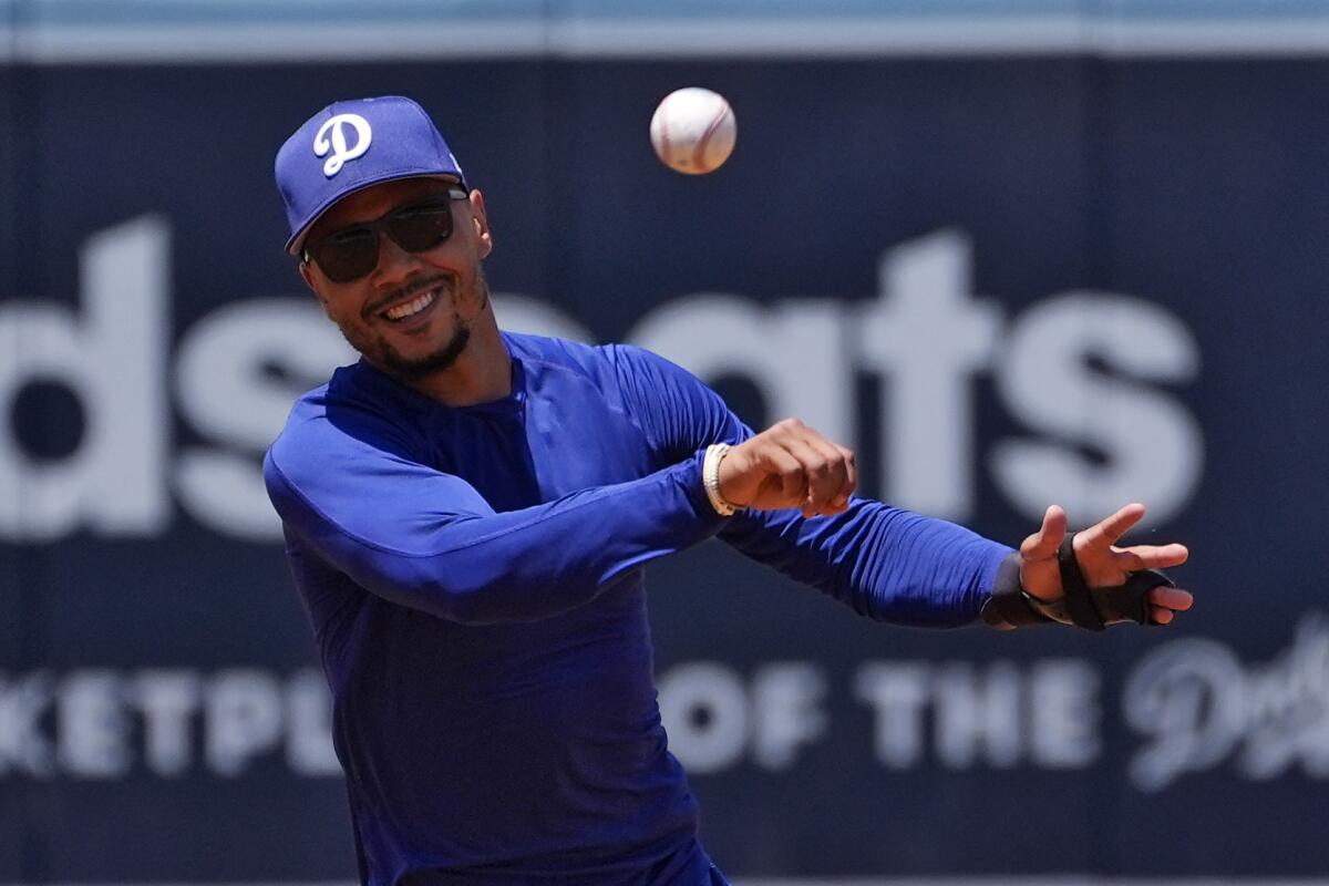 Dodgers shortstop Mookie Betts works out before a game against the Milwaukee Brewers on July 6.