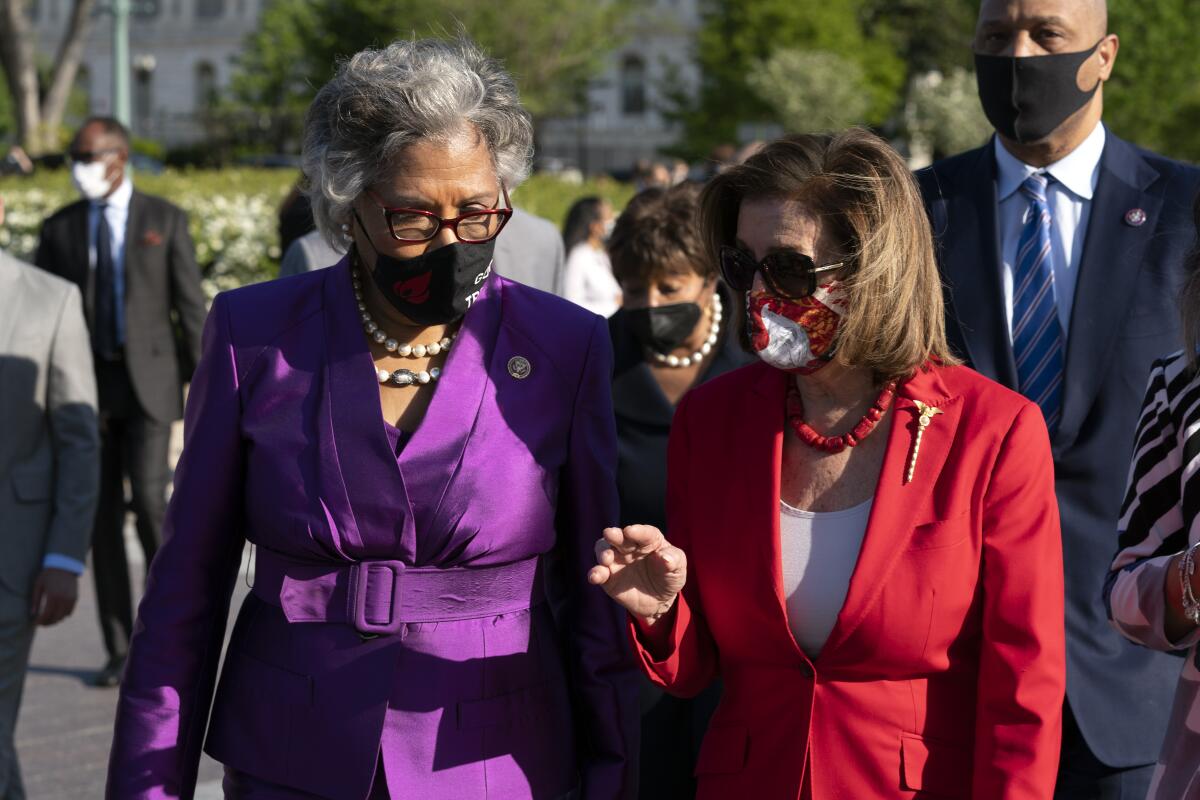 House Speaker Nancy Pelosi speaks with Rep. Joyce Beatty