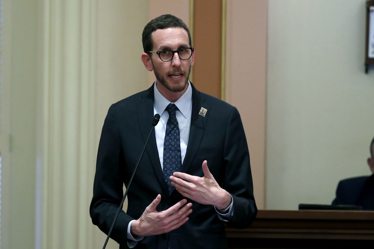 FILE - Democratic state Sen. Scott Wiener speaks during the Senate session at the Capitol on Jan. 21, 2020, in Sacramento, Calif. Wiener and state Sen. Ben Allen, D-Santa Monica, are backing the repeal of a law added to the state Constitution in 1950 that stops the government from building some affordable housing without voter approval. But to change the law, it requires voter approval and no one has stepped forward to pay for the expensive campaign it takes to convince people to vote for it. (AP Photo/Rich Pedroncelli, File)