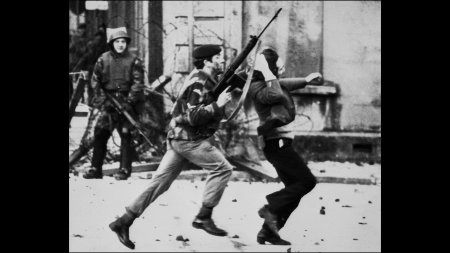 A British soldier drags a protester during a march, later known as "Bloody Sunday," in Londonderry, Northern Ireland.