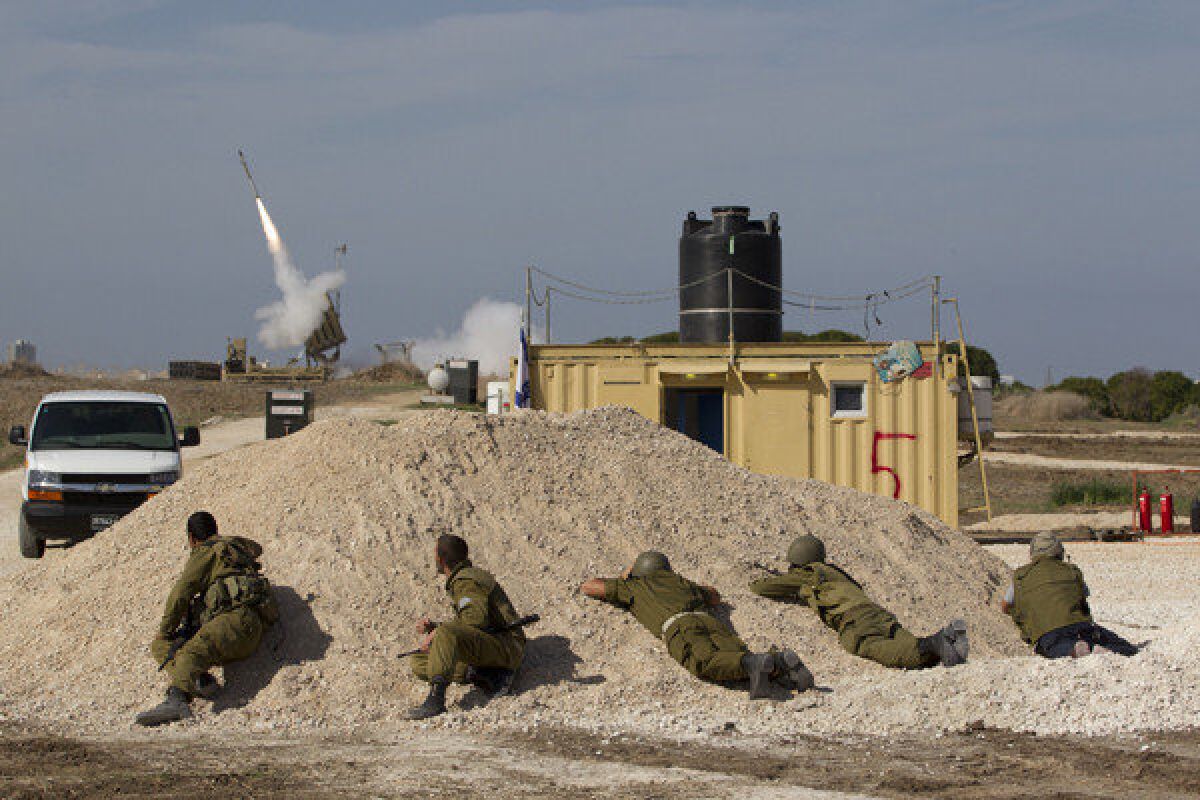 A missile is launched from a battery that's part of the Iron Dome system to intercept a rocket fired by Palestinian militants in the Gaza Strip.