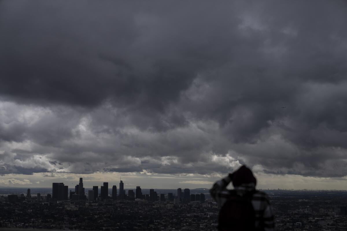 Storm clouds hover over Los Angeles skyline